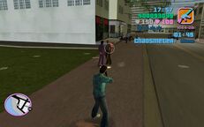 Tommy Vercetti shooting a pedestrian to draw attention.