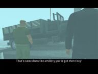 Toshiko Kasen's contact, Phil Cassidy, inspecting the weapons shipment as Toni Cipriani looks on.
