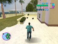 Tommy Vercetti about to collect one of the briefcases.