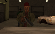 Emmet firing a pistol as Carl Johnson and Big Smoke approach him.