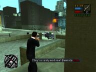 Toni Cipriani killing the hitmen with a shotgun.