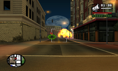 CJ blows apart the third roadblock with his rocket launcher.