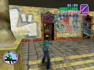 Tommy Vercetti shooting a Sharks gangster guarding the door.