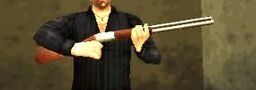 Toni Cipriani with a pump action shotgun in GTA Liberty City Stories.