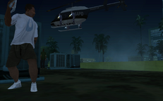 CJ and Sweet try to escape the police on a rooftop.