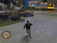 Claude running to D-Ice's car in Wichita Gardens.