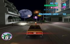 Tommy Vercetti driving behind Carl Pearson.