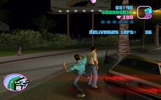 Tommy Vercetti attacking Carl Pearson.