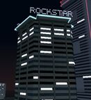 Nightlights atop the building in GTA Vice City Stories, depicting massive "ROCKSTAR" signage.