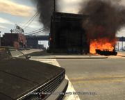 Niko and Roman Bellic discover Express Car Service burning.