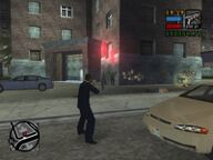 Toni Cipriani shooting at attacking Forelli Family mobsters.