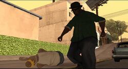 Big Smoke kicking the downed Vagos member