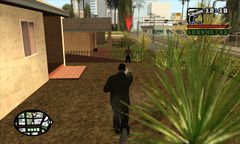 Carl Johnson giving chase to the Vagos member.