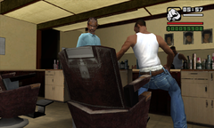 CJ sits down to get a haircut from Old Reece.