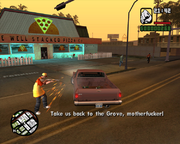 CJ drives Ryder away from the shotgun-wielding pizza parlor employee.