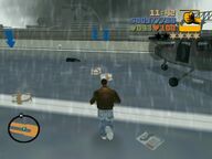 Claude collecting the SPANK packages from the runway after the plane was destroyed.