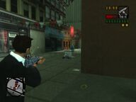 Toni Cipriani killing an attacking mobster as he and Salvatore Leone make their way back to Salvatore's bullet proof limousine.