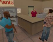 Marty Jay Williams and Victor Vance talking to the shop clerk at Mal Viento