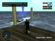 Toni Cipriani about to enter a boat at a jetty in Bedford Point.
