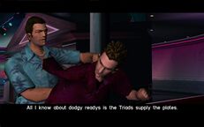 Tommy Vercetti questioning Kent Paul about the counterfeiting syndicate supposedly operating in Florida.