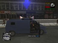 Toni Cipriani in the campaign van and about to campaign for Donald Love.