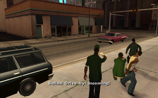 Sweet and Big Smoke open fire on an incoming Ballas car as Carl and Ryder take cover.