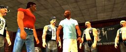 Vic and Lance Vance, surrounded by White Stallionz in The Bum Deal.