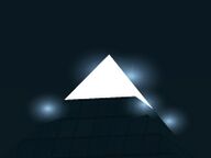 The tip of the pyramid light-up at night.