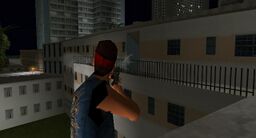 The Sharks gangster shooting Tommy Vercetti with a Kruger.
