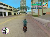 Tommy Vercetti following the Sharks gangster from Vice Point while being shot at.