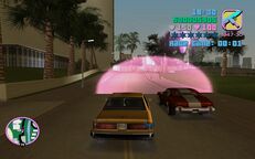 Tommy Vercetti chasing Hilary King shortly into the street race.