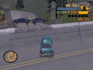 Claude about to use a car to break through a Colombian Cartel car blockade at Cochrane Dam.
