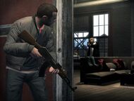 Niko taking cover from gunfire inside Playboy's apartment.