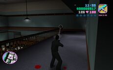 Tommy Vercetti killing a security guard.