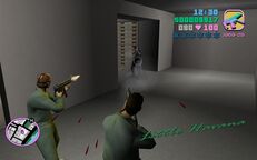 Tommy Vercetti and Cam Jones killing a security guard to access the Flange 900 safe in the bank vault.