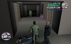 Tommy Vercetti taking the bank manager to Cam Jones to crack open the Flange 9000 safe.
