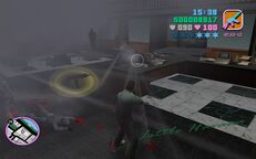 Tommy Vercetti shooting a SWAT officer.