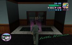 Tommy Vercetti about to leave the bank.