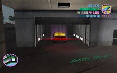 Tommy Vercetti driving the getaway car into a Pay 'n' Spray garage.