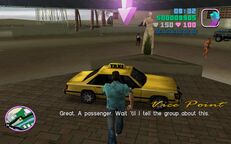 Tommy Vercetti about to enter the getaway car.