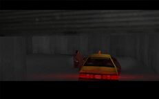 Tommy Vercetti driving the getaway car into Cam's Can Openers garage.