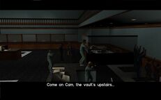 Tommy Vercetti, Phil Cassidy, and Cam Jones holding up El Banco Corrupto Grande.