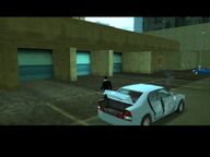 Toni Cipriani delivering the diamonds to a garage in the Liberty Tree car park.