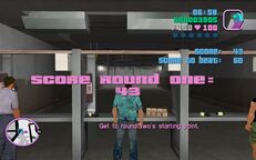 Tommy Vercetti and Phil Cassidy at the shooting range, with Vercetti having a score of 43 points.