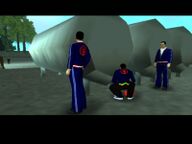 Three Triads planting an explosive to destroy the warehouse.
