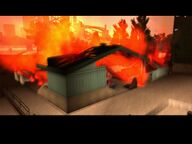The warehouse being destroyed.