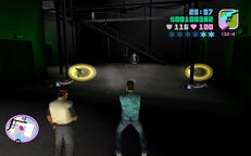 Tommy Vercetti shooting a Haitian.