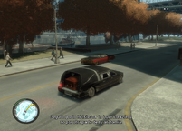 Niko Bellic driving the hearse away from the pursuing Albanian attackers and the police.