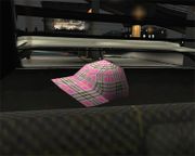 A Burberry cap inside a "LOZSPEED" Uranus.