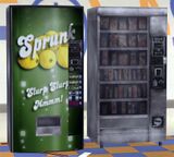 Vending machines for drinks (with Sprunk logo) and snacks in a 24/7 outlet.